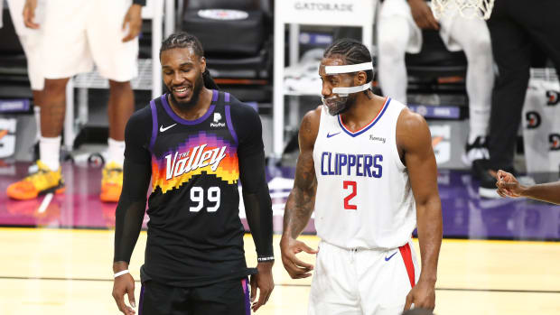 Jan 3, 2021; Phoenix, Arizona, USA; Phoenix Suns forward Jae Crowder (99) and Los Angeles Clippers forward Kawhi Leonard (2) talk in the second half at Phoenix Suns Arena. Mandatory Credit: Billy Hardiman-USA TODAY Sports